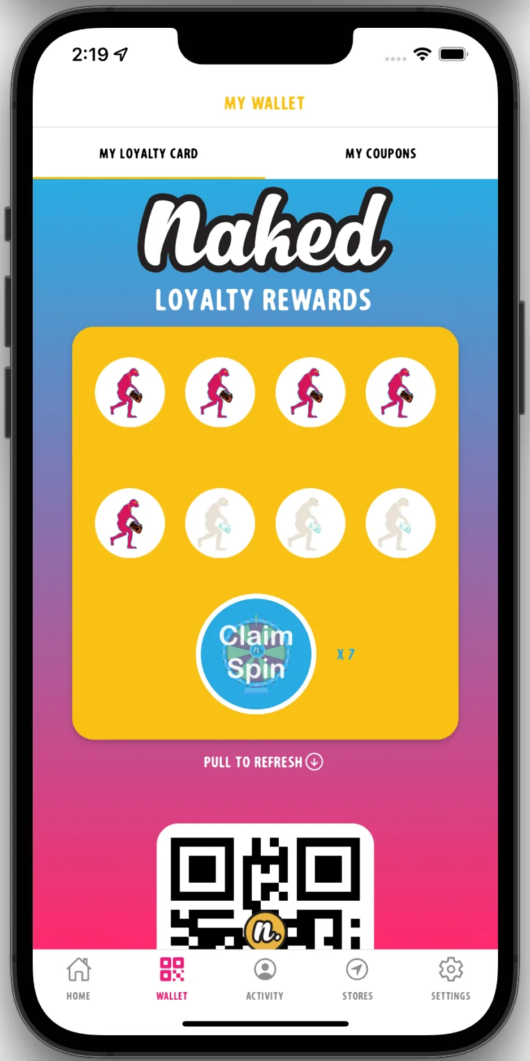 Naked Coffee app wallet showing its digital loyalty card, reward spins, QR code and navigation.
