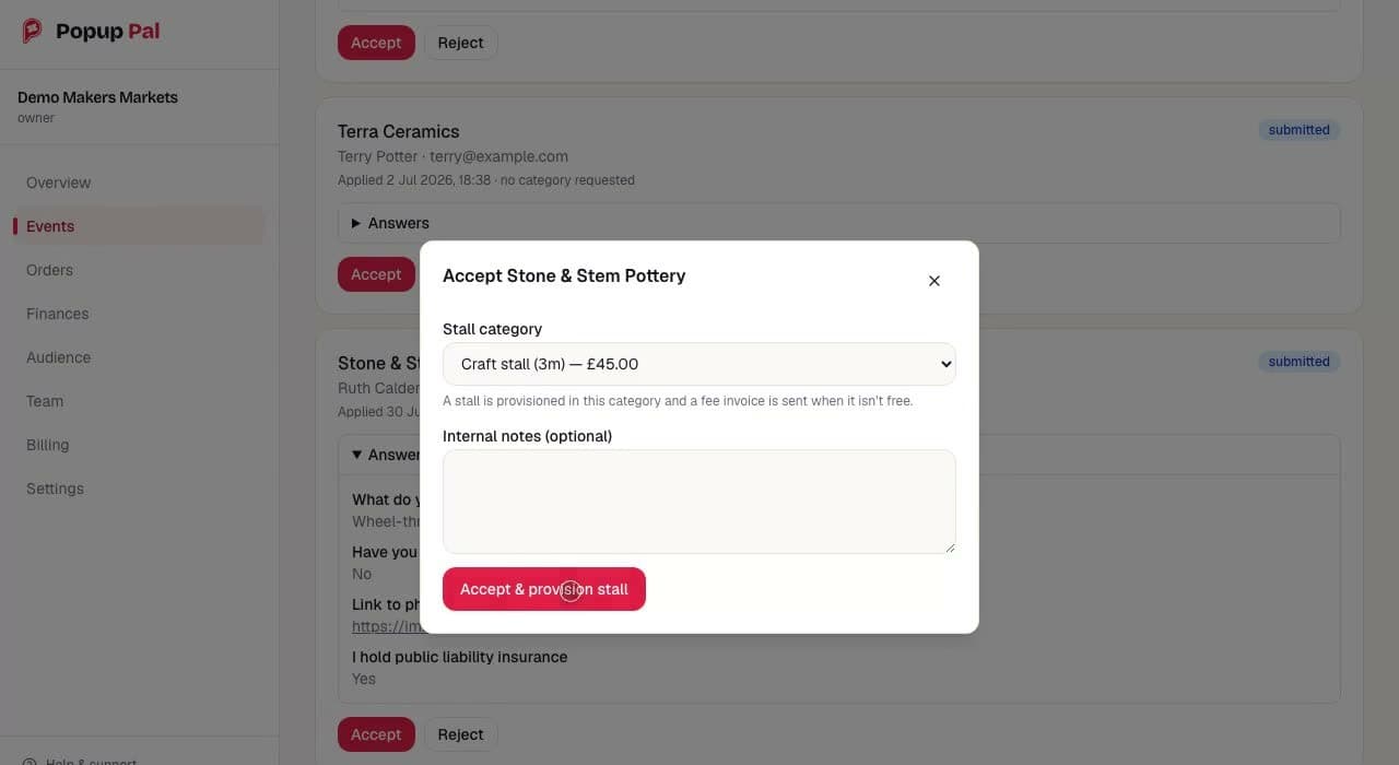 A dialog titled Accept Stone & Stem Pottery, open over the list of applications. It has a stall category menu set to Craft stall (3m) at £45.00, an optional internal notes field and a button labelled Accept & provision stall. Behind it, the trader's application answers are partly visible, including that they hold public liability insurance.